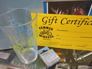 Bike pint glass, book, jewelry, and gift certificat
